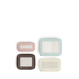 Set of Four / Multi Scaled | Set of four top view of Monos x Reformation compressible packing cubes in Multi colors