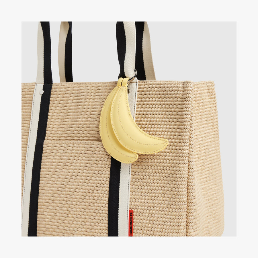 Banana | Close-up view of the Canopy Tote with the Banana Charm