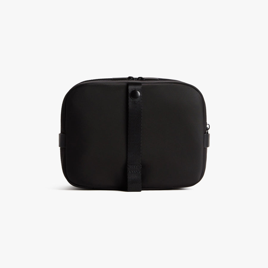 Carbon Black | Back view of Metro Hanging Toiletry Case in Carbon Black