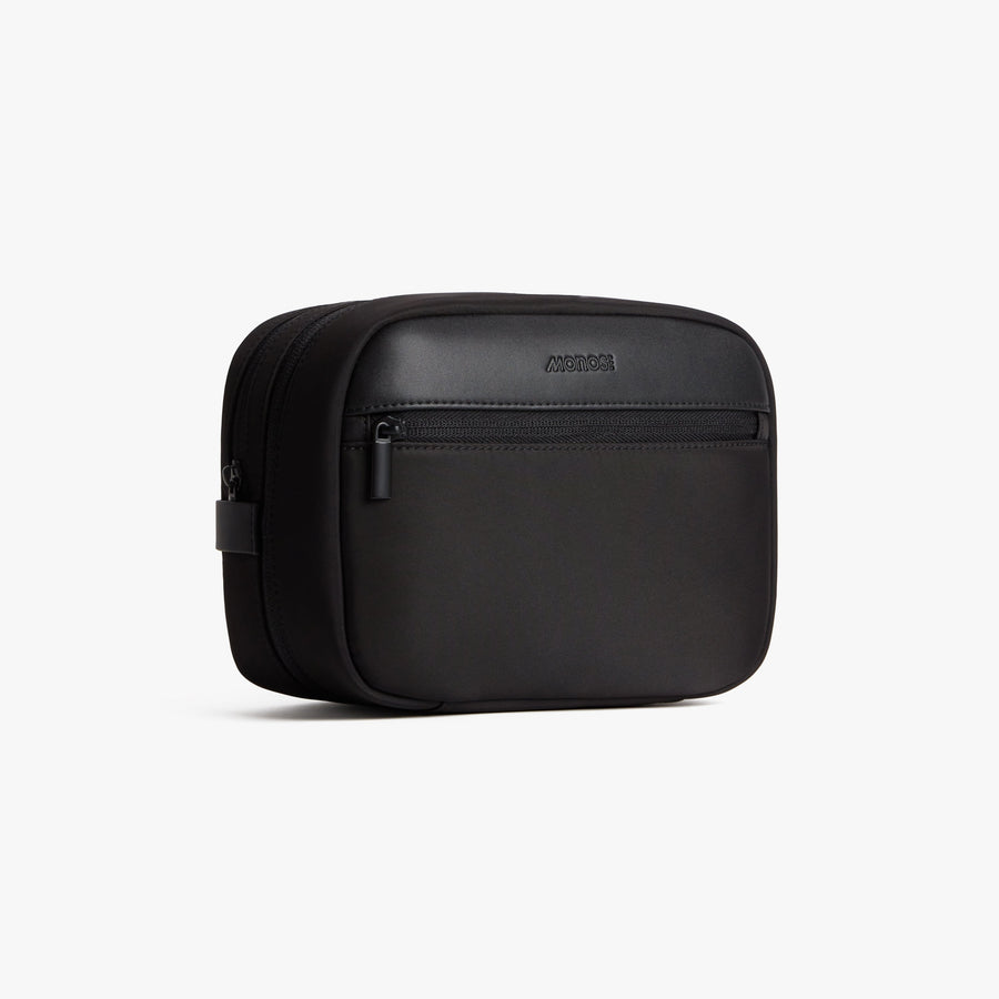 Carbon Black | Side view of Metro Hanging Toiletry Case in Carbon Black