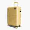 Angled view of Carry-On Plus in Banana Pudding (Glossy) (thumbnail)