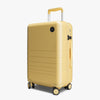 Angled view of Carry-On in Banana Pudding (Glossy) (thumbnail)