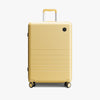 Front view of Check-In Medium in Banana Pudding (Glossy) (thumbnail)