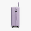 Side view of Check-In Medium in Purple Icing (Glossy) (thumbnail)