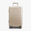 Front view of Aluminum Carry-On Plus in Champagne Gold (thumbnail)