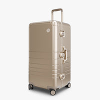 Angled view of Aluminum Trunk in Champagne Gold (thumbnail)