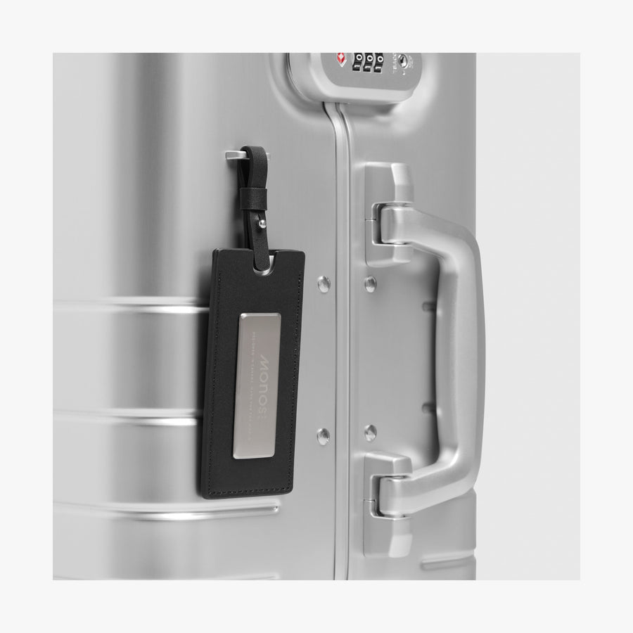 Aspen Silver | Luggage tag view of Aluminum Carry-On Plus in Aspen Silver