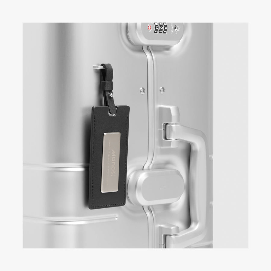 Aspen Silver | Luggage tag view of Aluminum Check-In Medium in Aspen Silver