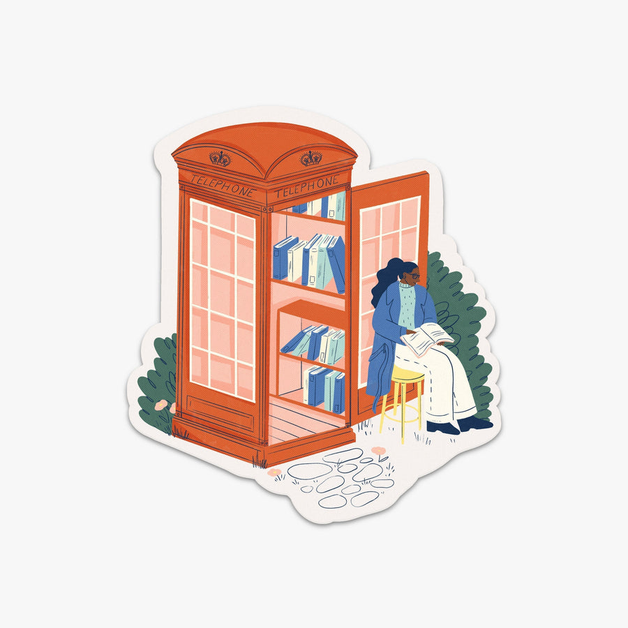 London | Destination Stickers London telephone booth with books inside and a woman reading