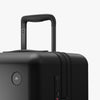 Luggage handle view of Expandable Check-In Medium in Midnight Black (thumbnail)
