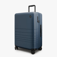 Angled view of Expandable Check-In Medium in Ocean Blue (thumbnail)
