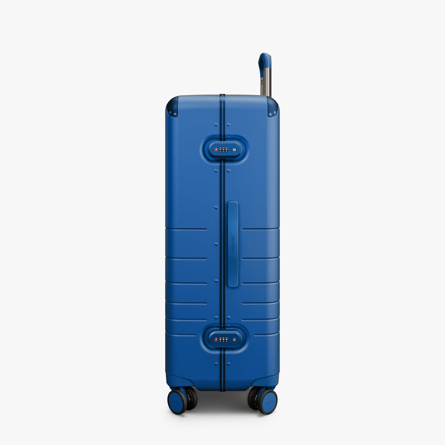 Coastal Blue | Side view of the Hybrid Check-In Large in Coastal Blue