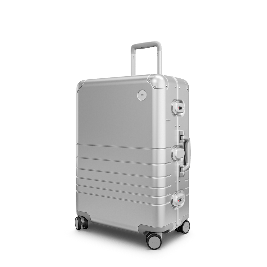 Aspen Silver Hover | Angle view of Aluminum Check-In Medium in Aspen Silver