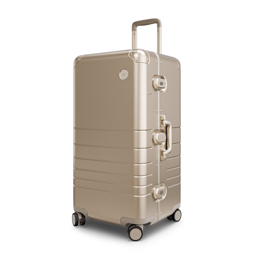 Champagne Gold Hover | Angle view of Aluminum Trunk in Champagne Gold