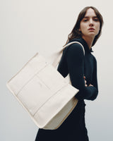 The Gesso Tote in Ecru — a minimalist canvas carryall designed for everyday versatility, blending refined simplicity with effortless style.