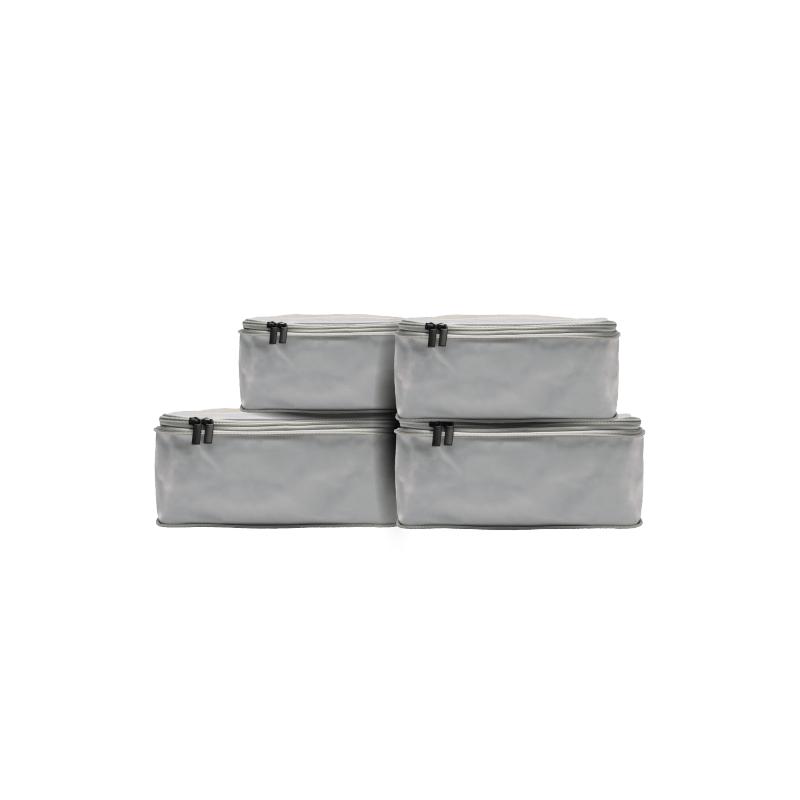 Set of Four / Grey Hidden | This is a photo of a set of four compressible packing cubes in grey