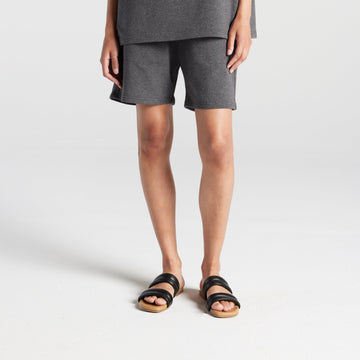 Front view of man in Kyoto Shorts in Heather Charcoal