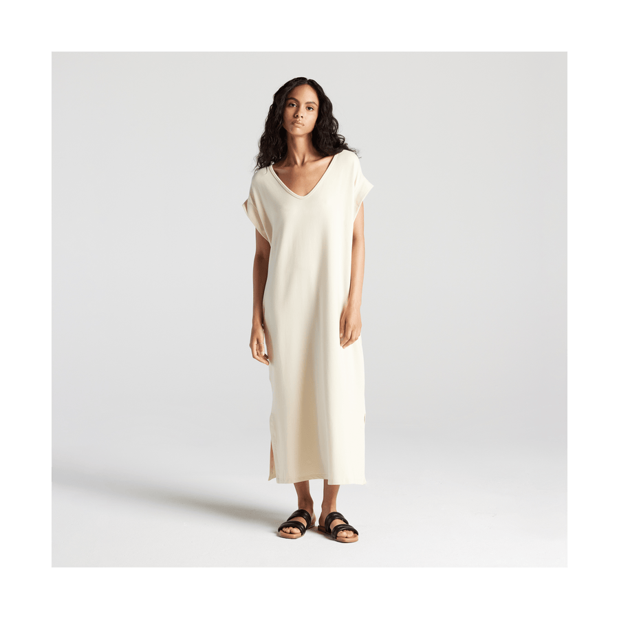 Cream Scaled | Full body front view of woman in Sevilla Dress Cream