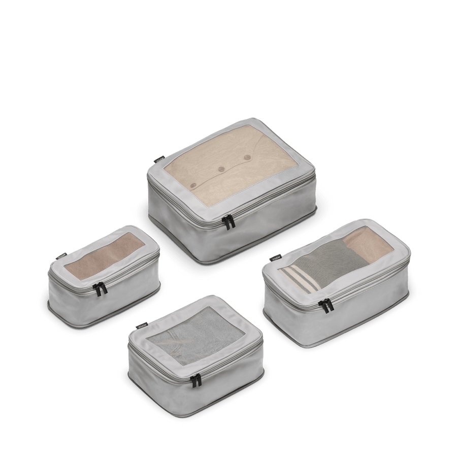 Set of Four / Grey Scaled | This is a photo of a set of four compressible packing cubes in grey