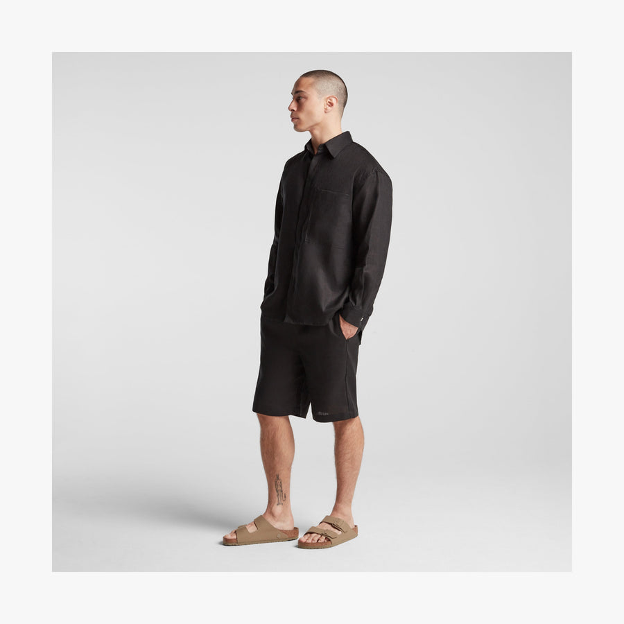 Black | Full body side view of Algarve Shorts in Black