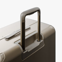 Extended luggage handle view of Hybrid Check-In Large in Champagne (thumbnail)