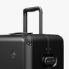 Luggage handle view of Hybrid Check-In Large in Obsidian (thumbnail)