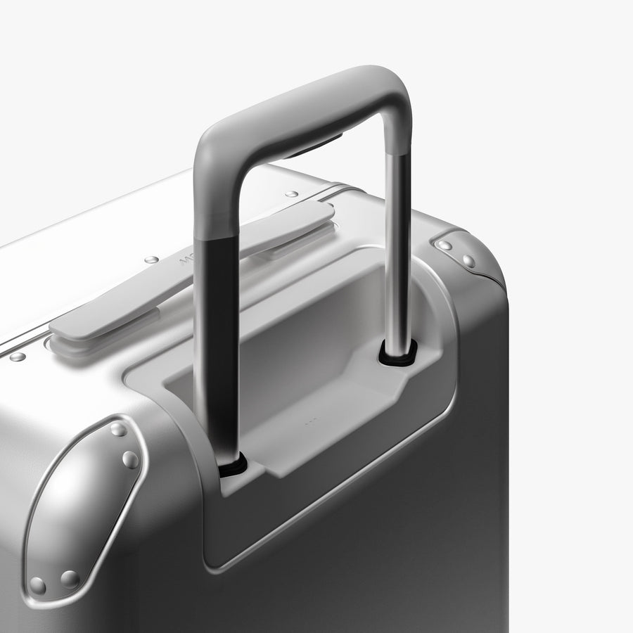 Silver | Extended luggage handle view of Hybrid Carry-On Plus in Silver
