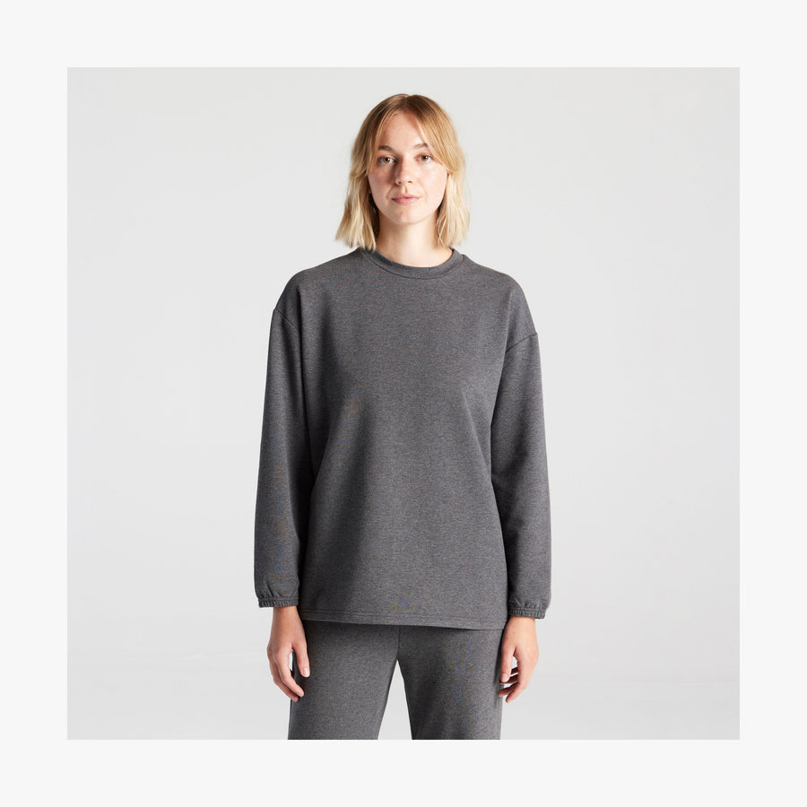 Heather Charcoal | Front view of female in Kyoto Long Sleeve in Heather Charcoal