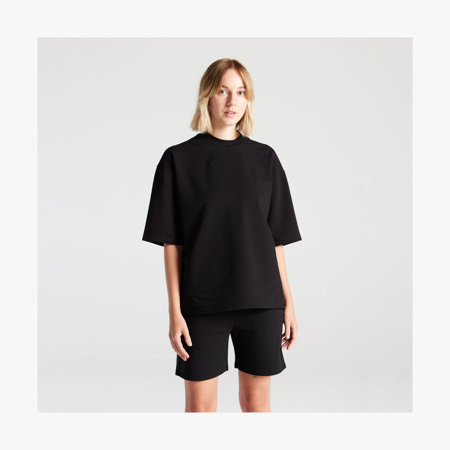 Black | Front view of woman in Kyoto Short Sleeve in Black