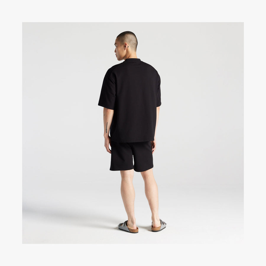 Black | Full body back view of man in Kyoto Short Sleeve in Black