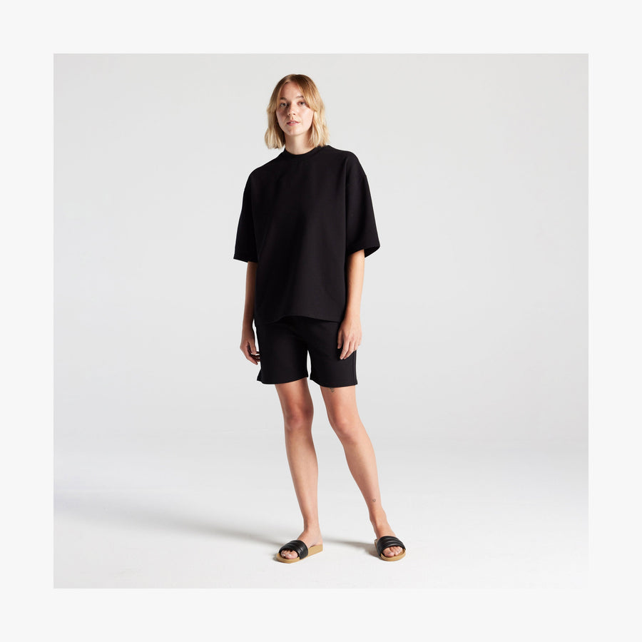 Black | Full body front view of woman in Kyoto Short Sleeve in Black
