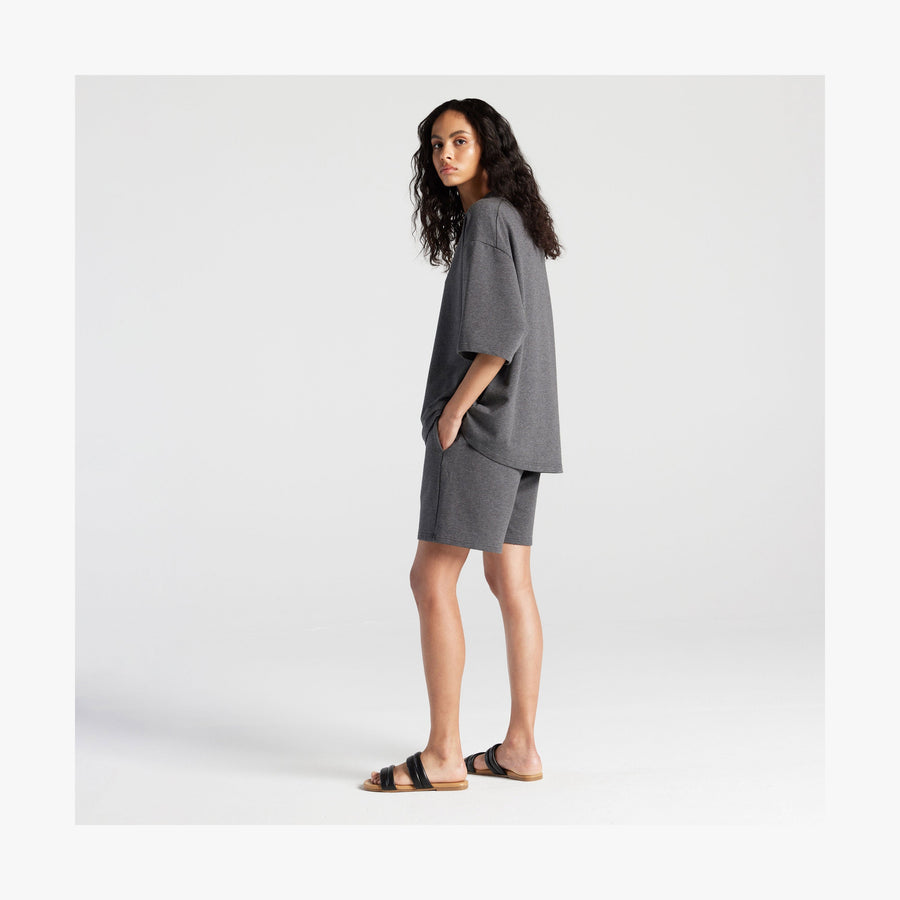 Heather Charcoal | Full body side view of woman in Kyoto Shorts in Heather Charcoal