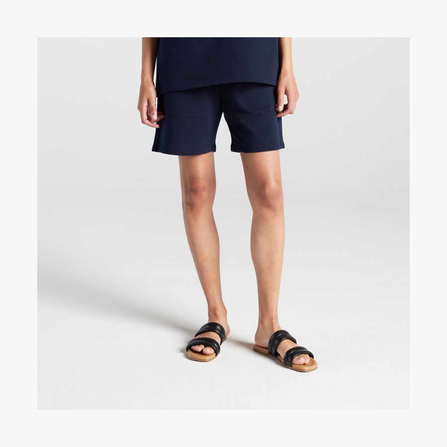 Navy | Front view of woman in Kyoto Shorts in Navy