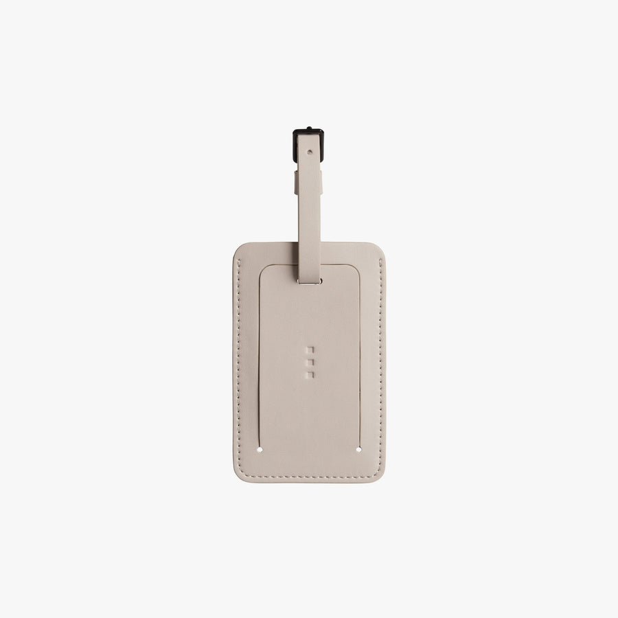 Desert taupe, luggage tag, vegan leather accessories | monos travel luggage and bags
