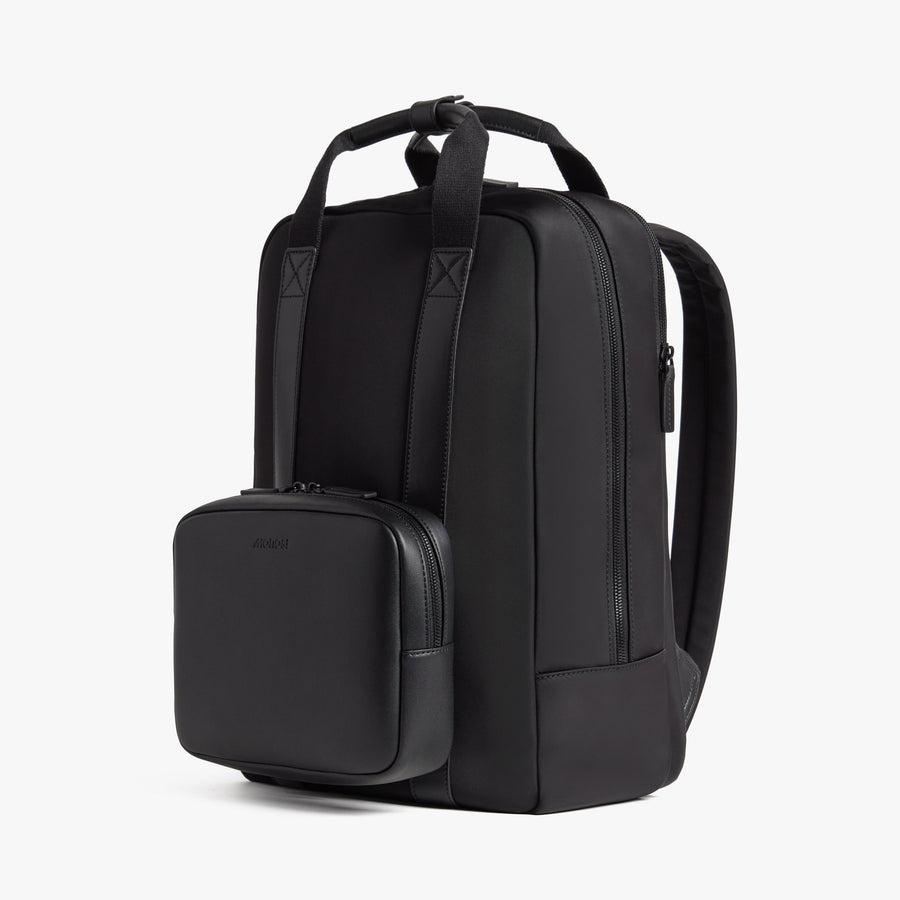 Carbon Black | Angled view of Metro Backpack in Carbon Black