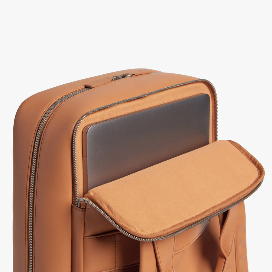 Saddle Tan (Vegan Leather) | View padded laptop sleeves on Metro Backpack Saddle Tan