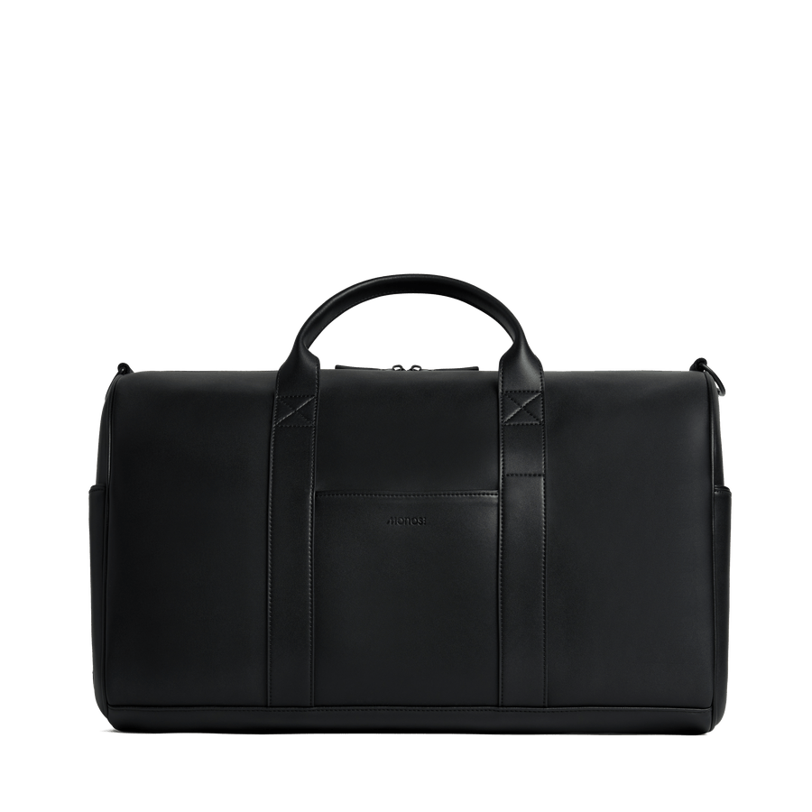 Carbon Black (Vegan Leather) Scaled | Front view of Metro Carry-All Duffel Carbon Black