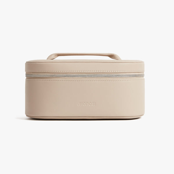https://ca.monos.com/cdn/shop/products/Monos-Accessories-Cosmetic-Case-Ivory-1-Front-View_600x.jpg?v=1700631601