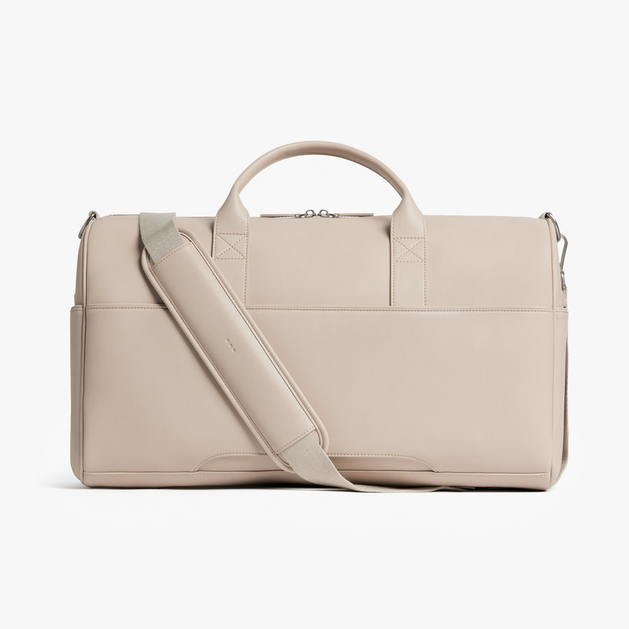 Ivory (Vegan Leather) | Back view of Metro Carry-All Duffel Ivory