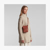 Angled view of Metro Mini Crossbody in Mahogany (thumbnail)