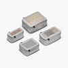 This is a photo of a set of four compressible packing cubes in grey (thumbnail)