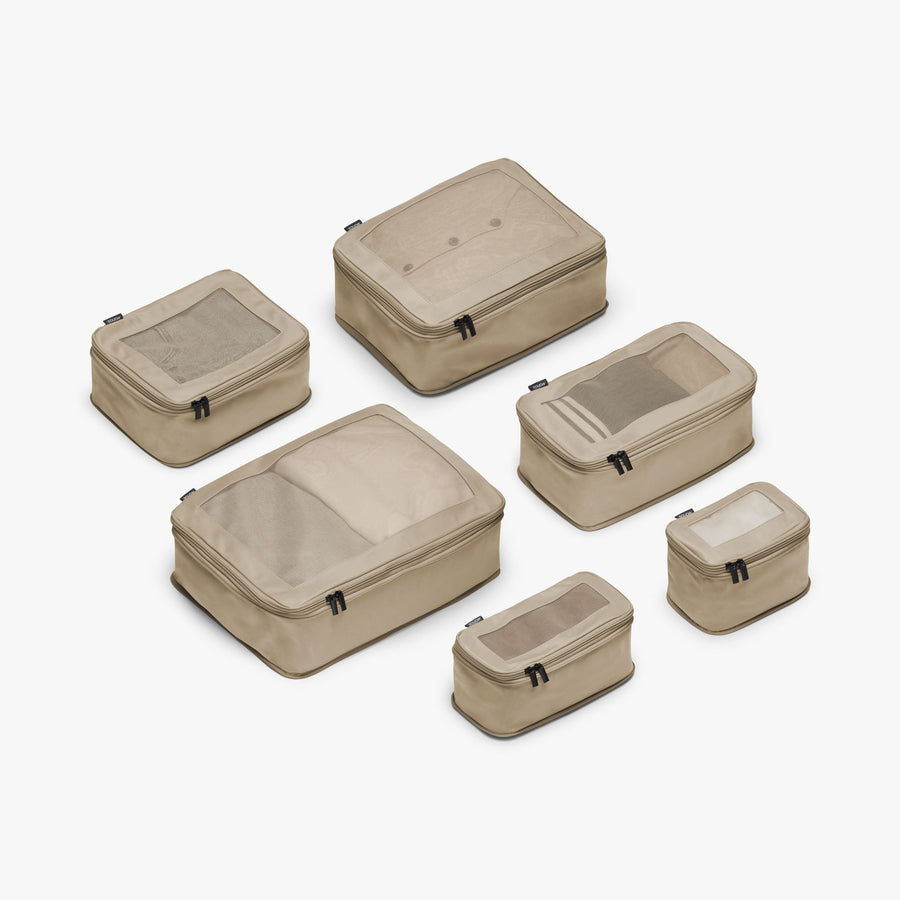 Set of Six / Tan | This is a photo of a set of six compressible packing cubes in tan