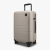 Angled view of Carry-On Plus in Desert Taupe (thumbnail)