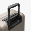 Extended luggage handle view of Carry-On Plus in Desert Taupe (thumbnail)
