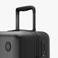 Luggage handle view of Carry-On in Midnight Black (thumbnail)