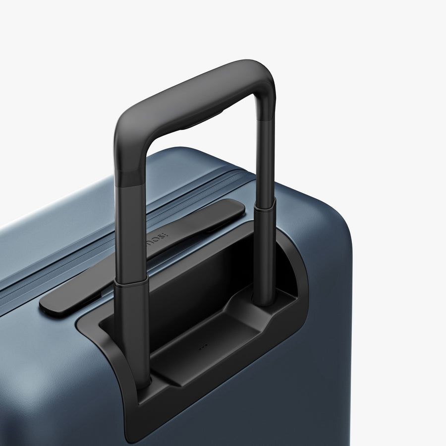 Ocean Blue | Extended luggage handle view of Carry-On Pro Plus in Ocean Blue