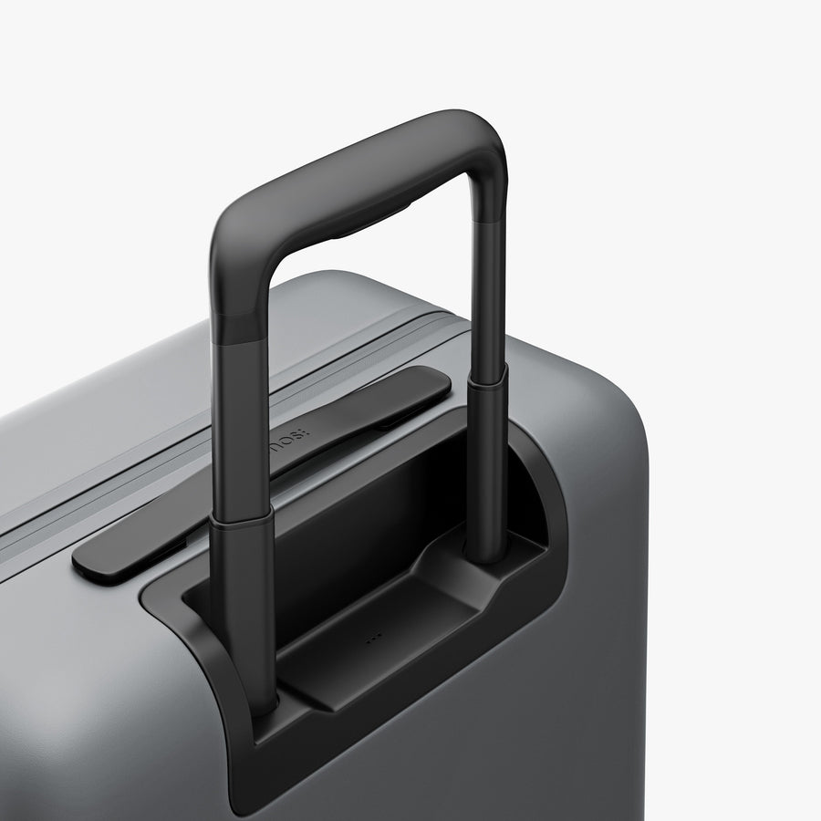 Storm Grey | Extended luggage handle view of Carry-On Pro in Storm Grey
