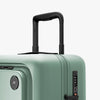 Luggage handle view of Carry-On Plus in Sage Green (thumbnail)