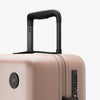 Luggage handle view of Carry-On in Rose Quartz (thumbnail)