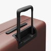 Extended luggage handle view of Check-In Large in Terracotta (thumbnail)